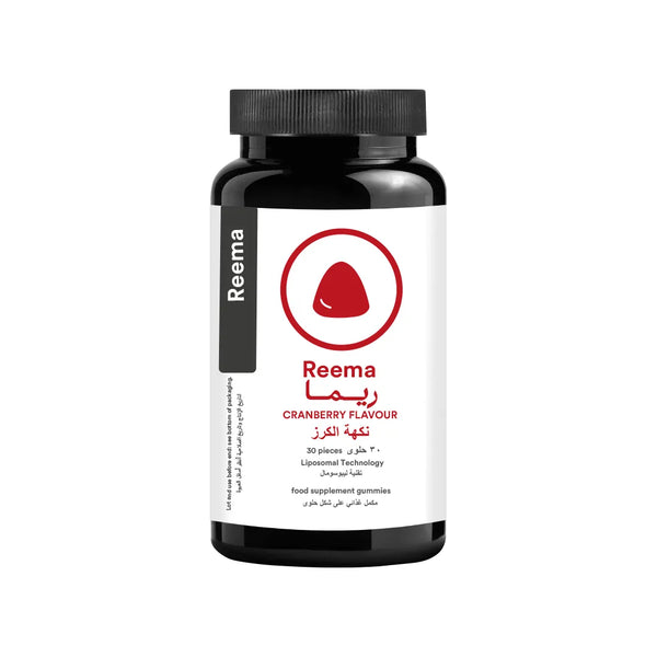 Bottle of Reema cranberry-flavored supplements on a white background