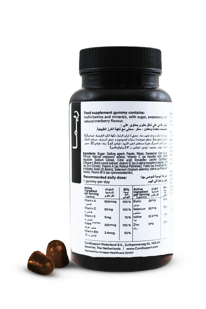 Supplement bottle with label and gummies on a white background