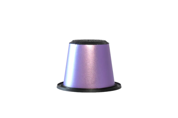 Purple and black coffee filter on a white background